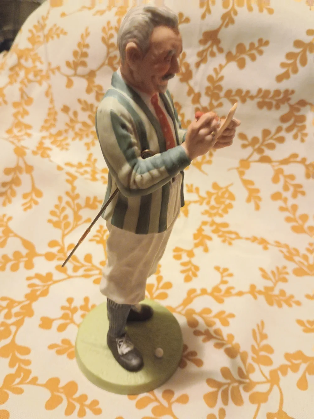 Norman Rockwell Ceramic Figurine in Cream and Green